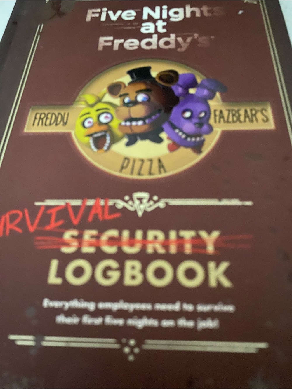 Scholastic Five Nights at Freddy's Brown and Purple Character Logbook